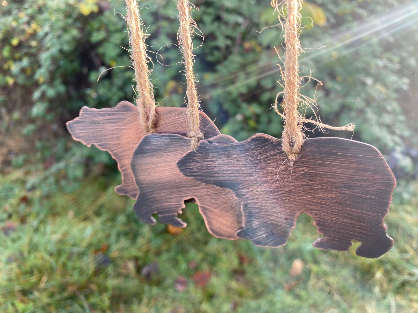 Handsawn copper bears