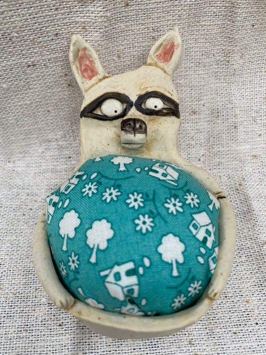 Trash panda pin cushion